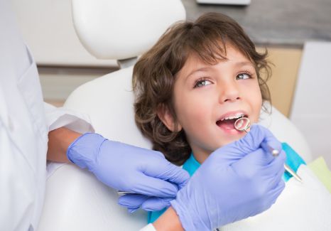 Young boy getting a dental exam