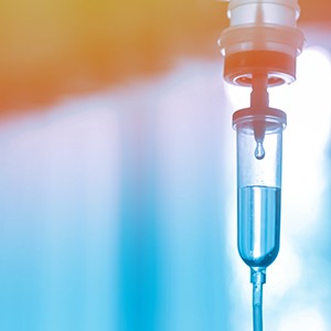 a close-up of an IV drip