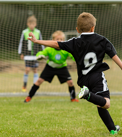 Kids playing soccer